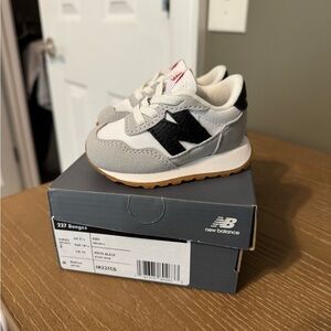 New Balance Toddler White and Black Sneakers